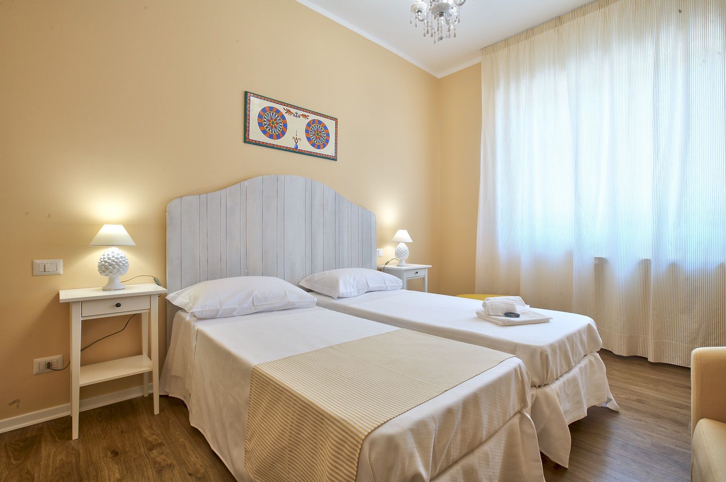 The Yellow Room with Sicilian cart paintings