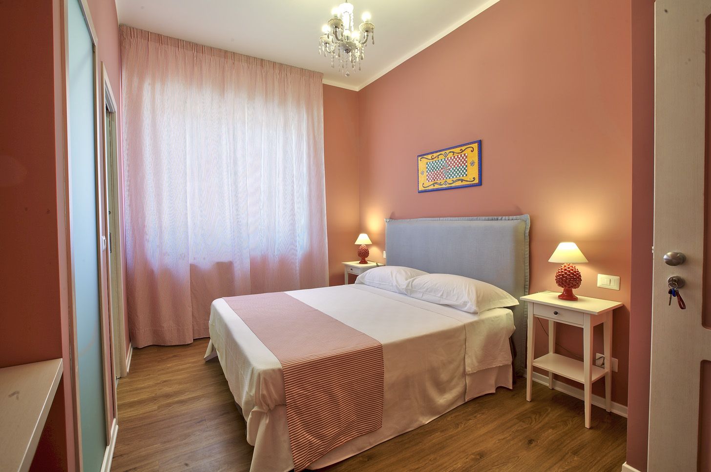 The Red Room with ceramic pine-cone lamps